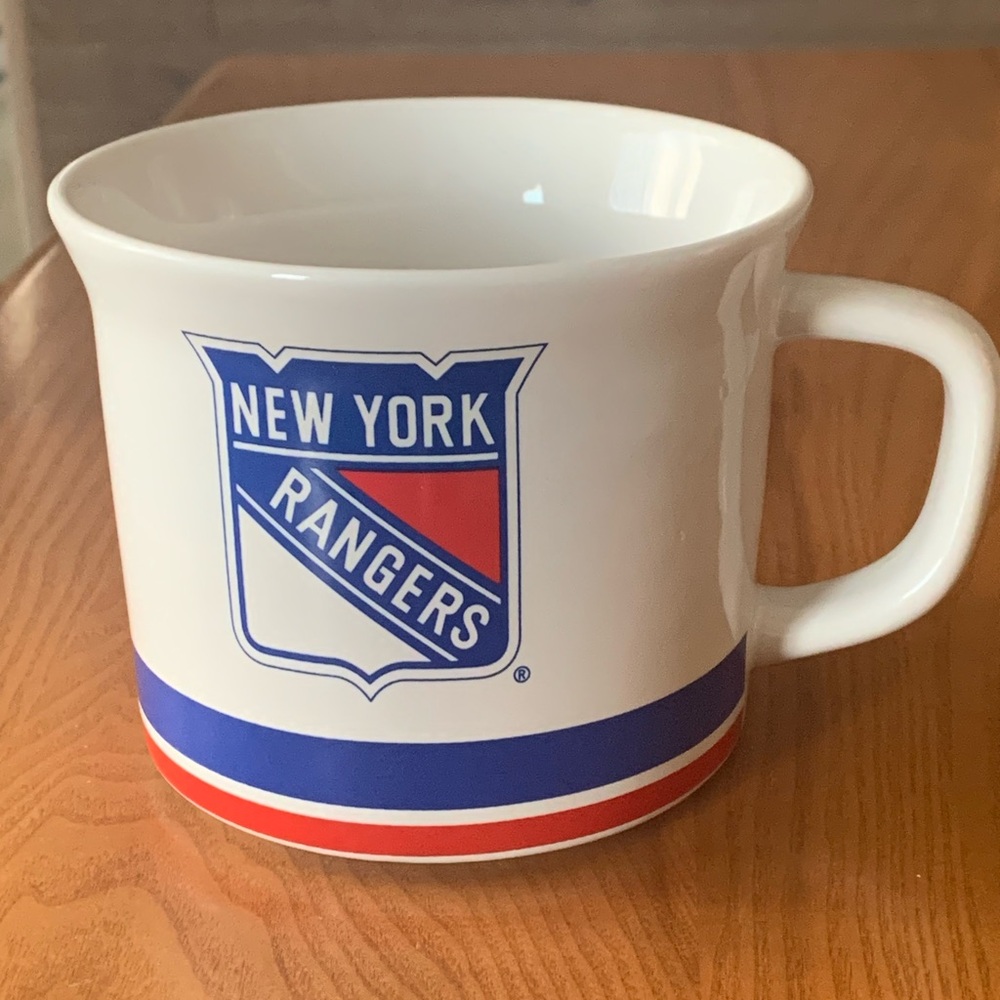 Blue and White Ceramic Mug with Hockey Design
